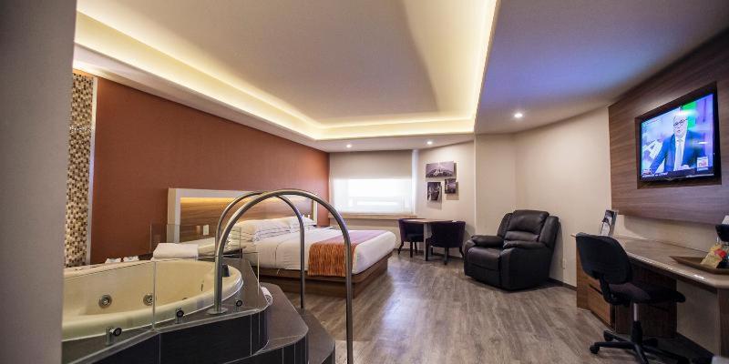 Hotel JF Grand Puebla Zimmer foto
